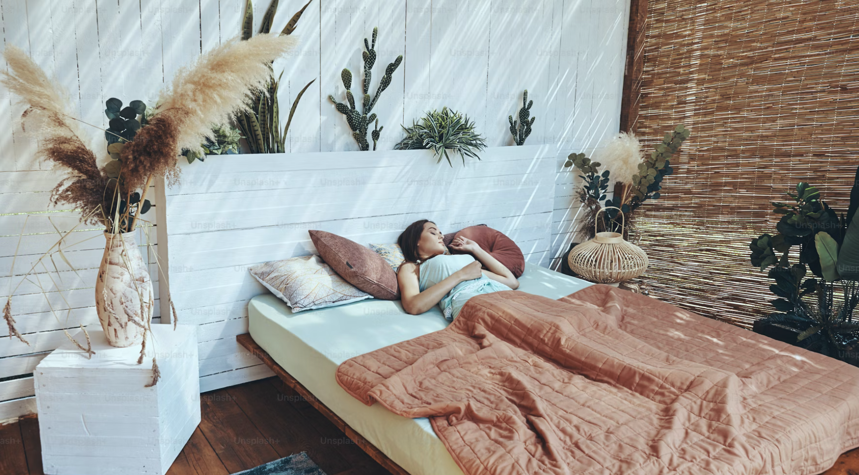 Image of an adult in bed sleeping